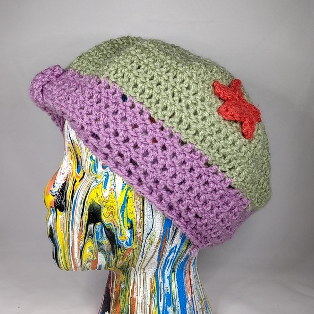 Cute knit hat with red flower accent